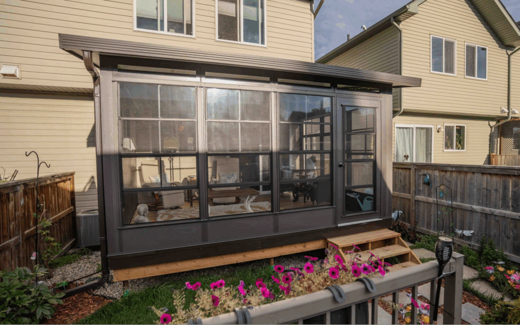 Enclosed patio room with screened windows