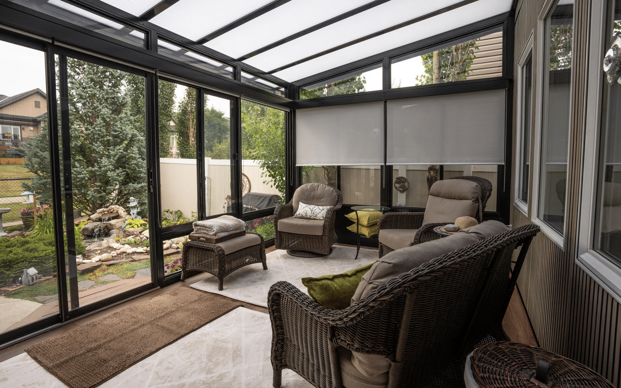 Patio room with dark framing and lounge chairs