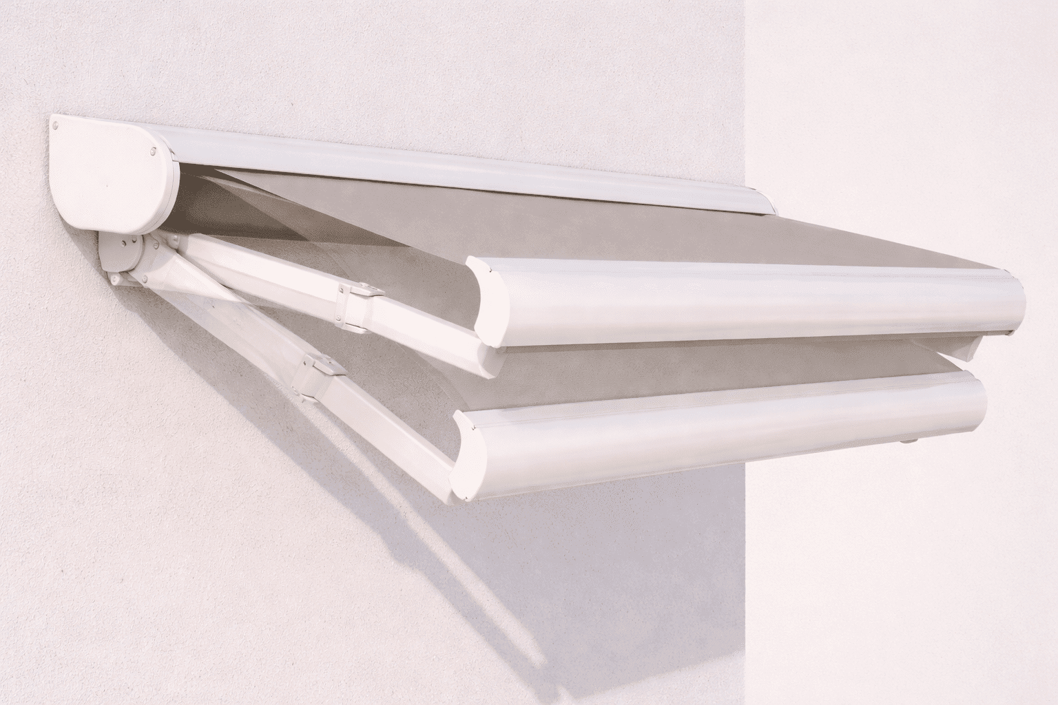 Awning arm and fabric detail in neutral color