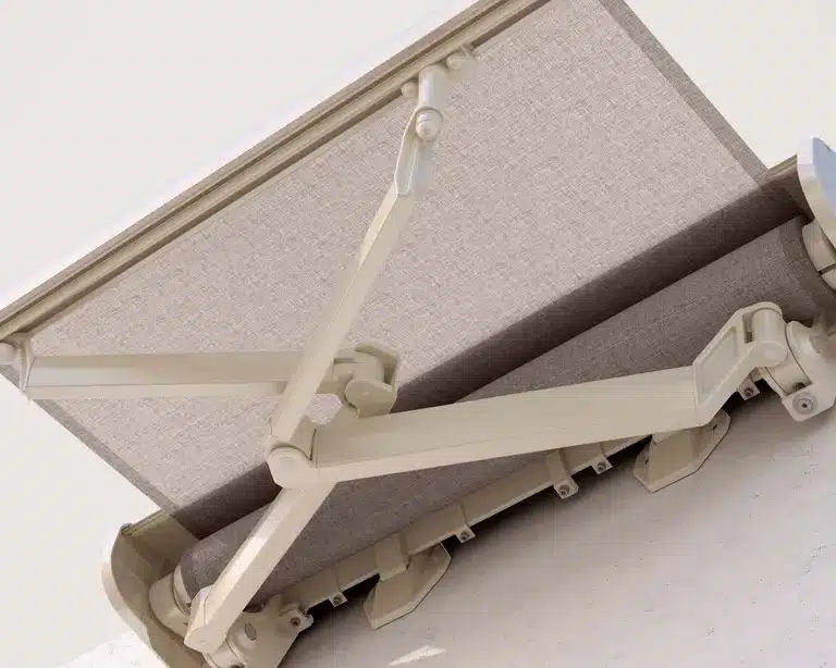 Close-up of retractable awning fabric and folding arms