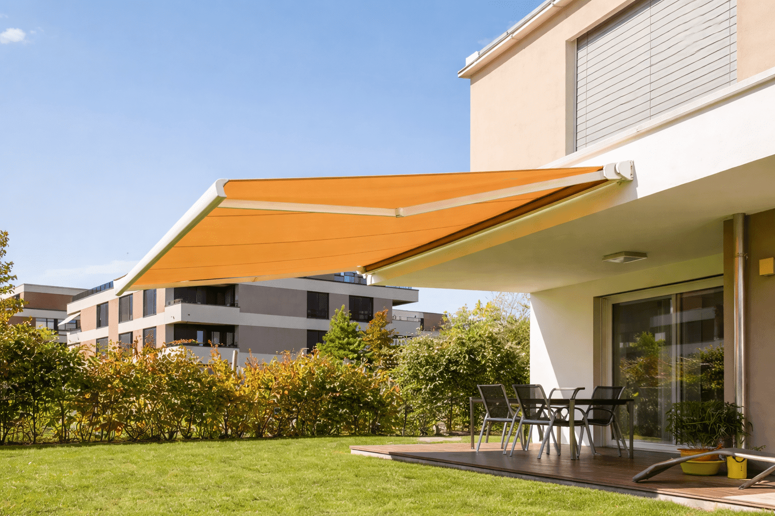 Angled awning providing shade on outdoor space