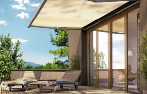 Awning shading outdoor seating near sliding doors