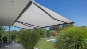 Fabric awning extended from building façade