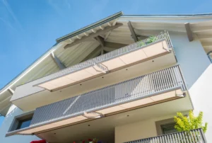 Extended awning shading modern home exterior