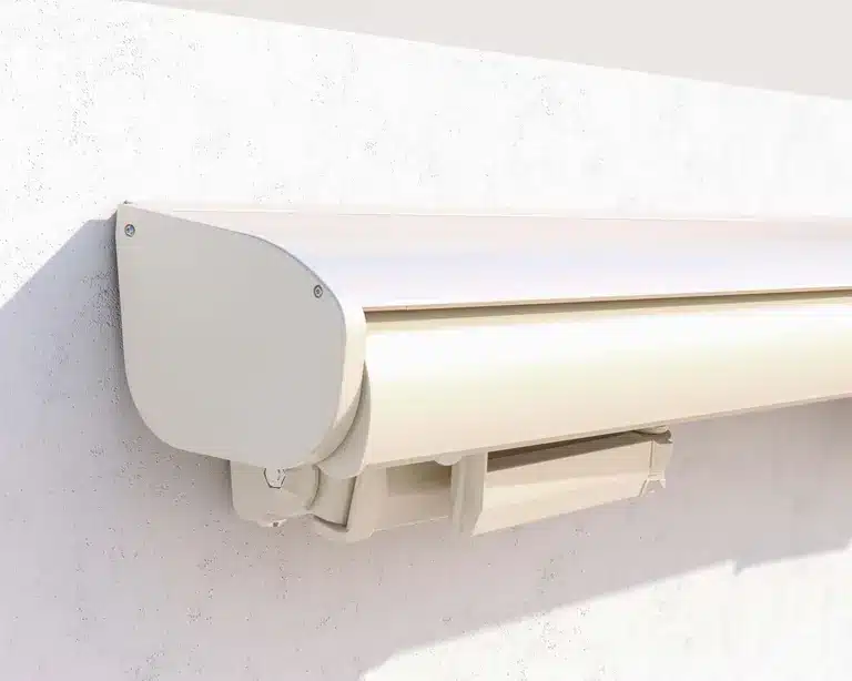 Wall-mounted awning cassette in closed position