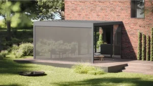 Vertical zip screen lowered on outdoor pergola for sun protection