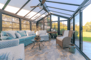 Glass-roof sunroom with insulated structure and lounge furniture