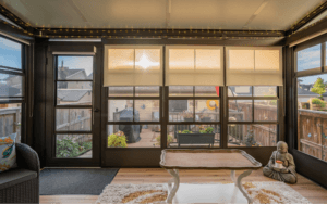 Sunroom with insulated windows and roller shades