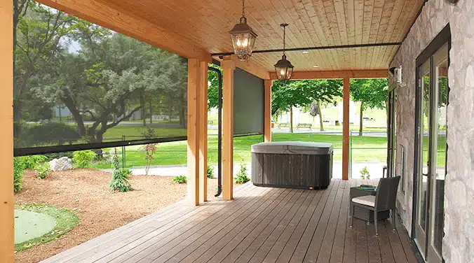 Wood-framed pergola covering outdoor seating area