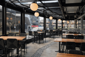 Restaurant terrace enclosed with retractable screens