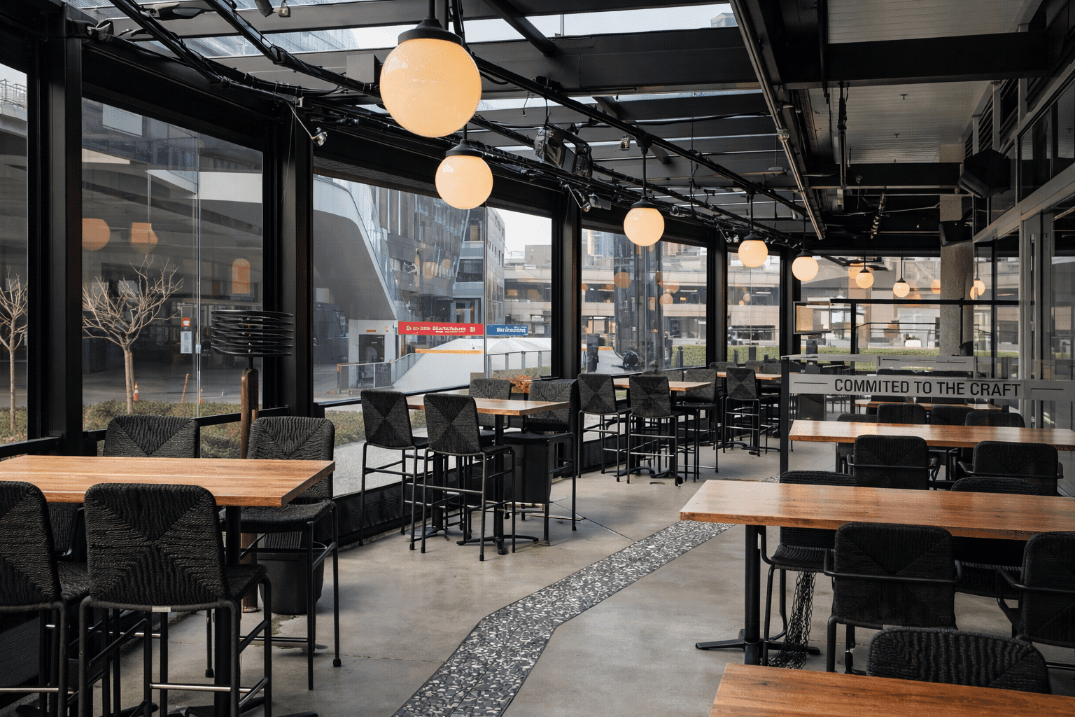 Restaurant terrace enclosed with retractable screens